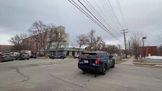 Billings Police and SWAT team members surround Prairie Tower Monday