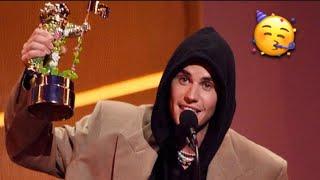 Justin Bieber accepting Artist of the Year award at the VMAs 