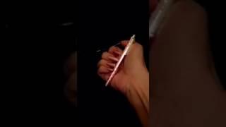 BuMaKa's polished long nails and a pen (video 11)