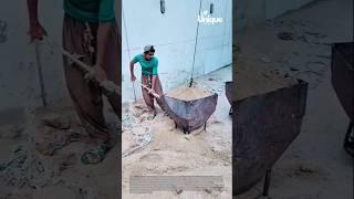 Man pulls heavy sand load: the power of simple machines