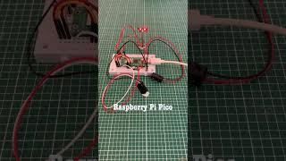 Beam break activated Raspberry Pi Pico model railway level crossing lights