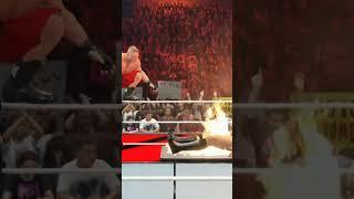 Brock Lesnar delivers a frog splash to Gunther onto a flaming table #wwe #wwe2k24 #gaming #gameplay