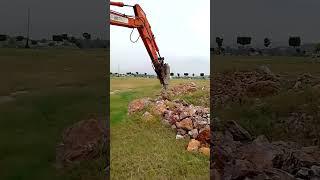 Excavator Jack Hammer Crushing Stone - Ultimate Demolition Power!