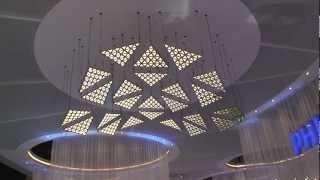 Living Sculpture kinetic light installation with DMX winches and motorized OLED light elements