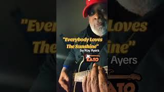 Playing my guitar and singing “Everybody Loves The Sunshine" by Roy Ayers 