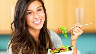 Women eating salad alone while laughing - Fact & Fringe