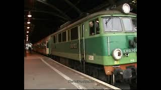 PKP LOCOMOTIVE EU07 023 DEPARTS WROCLAW GLOWNY STATION WITH A PASSENGER TRAIN IN POLAND 12/09/08