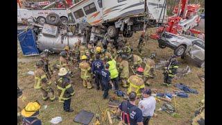 Jacksonville Fire Rescue Department has one trapped w/RV on a  truck requiring technical rescue team
