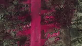 Drone footage shows red fire retardant on Oregon town