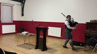 Andrew Yu delivers a talk on Scottish bagpiping in Hong Kong on 8 Oct 2022