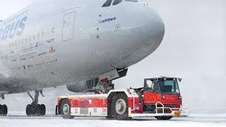 The Insane Amount of Power Pushback Trucks Pack to Move Giant Aircraft