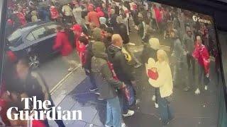 CCTV footage shows cars moving through groups of Liverpool fans before collision