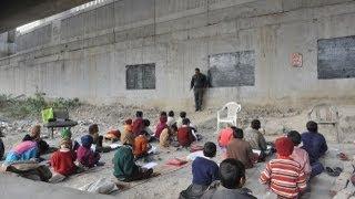 School Under A Bridge: Teacher Under A Bridge in India