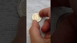 133. Two coins with minor errors. 2 € of Spain in 1999