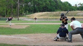 Hartford Hawks shortstop Derek Hall hits a homerun against the Lannon Stonemen