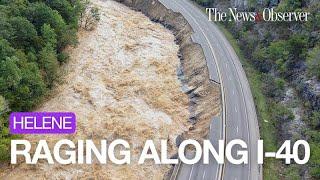 Watch the raging Pigeon River wash away I-40 after Helene