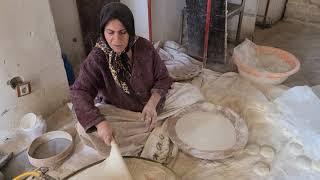 Iran Travel 4K Ancient bakery in Iran. Bakhtiari traditional bread. "Noon Tiri"