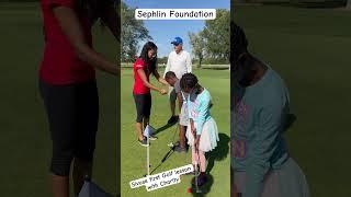 Sephlin Golf Foundation.  Sivuse first Golf Lesson with Instructor Charity.