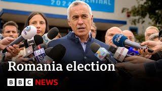 Far-right candidate takes shock lead in Romania presidential election | BBC News