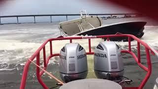 Parbuckling a 27' catamaran by Stuart Florida causeway