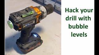 Hacking my drill.  Add bubble levels for horizontal and vertical drilling.