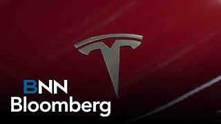 Tesla shares dip following drop in annual deliveries