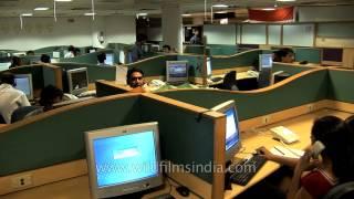 Indian BPO or call center workers in office