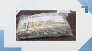 TxDOT workers find cash on side of road