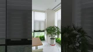 Add glamor to your large French windows with motorized zebra blinds