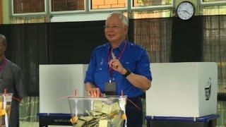 Prime Minister Najib Razak votes in Malaysia election