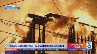 1 person critically injured in Chinatown apartment building fire