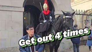 Kings guard  moves his horse to make tourist  leave #kingsguard