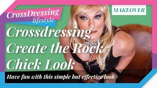 Crossdressing Rock Chick look, wet look trousers statement jewellery & high heel ankle boots.