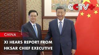 Xi Hears Report from HKSAR Chief Executive