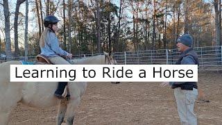 Beginner rider learning how to ride a horse. I also discuss my instructor teaching methods.