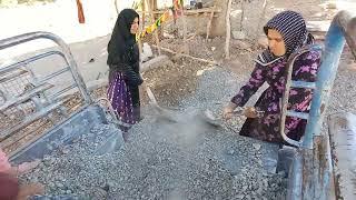 Repairing the yard of Fariba's house with mountain sand