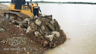 Mind Blow Operator Bulldozer Moving Stone Into Water Preparing Base Boundary Landfill In Big Lake