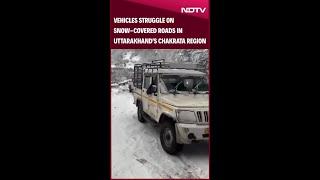 Vehicles Struggle On Snow-Covered Roads In Uttarakhand's Chakrata Region