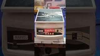 WEIGHING SCALE SHOWN LOBAT. SOLUTION