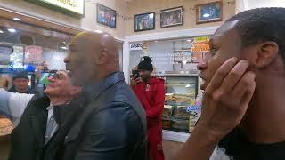 . Mike Tyson and Bruce Shu shu Carrington Napoli's Pizza. Brownsville December 19, 2022