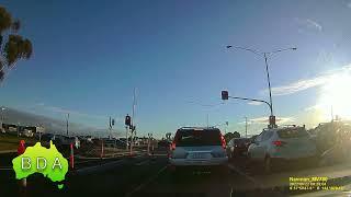 BAD Driving Australia - if all else fails just add another lane and go through the redlight!