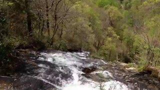 View of the waterfall  from  above. Вид на водопад сверху.