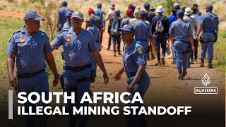 South Africa illegal mining standoff: Hundreds remain underground in disused gold mine