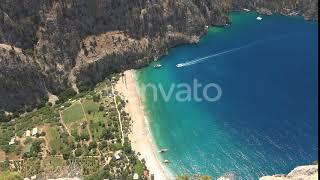 Deep Rocky Narrow Valley by the Turquoise Sea