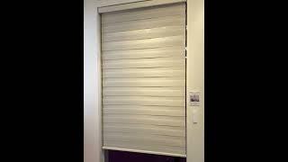 Double thick motorized zebra blinds provide excellent light control and privacy