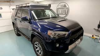 Toyota 4runner center hood wrapped in deep black Satin vinyl wrap before and after.