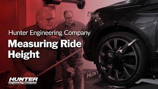 Measuring ride height for alignment and ADAS work