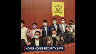 Hong Kong ousts 4 pro-democracy lawmakers after China ruling