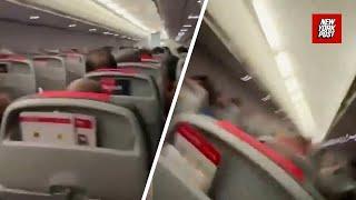 Passengers scream in terror as sandstorm strikes plane, while sky turns red in Australia
