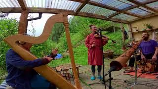 Techno Beats in the Rain: A Groovy Garden Jam with Didgeridoo and Cajon